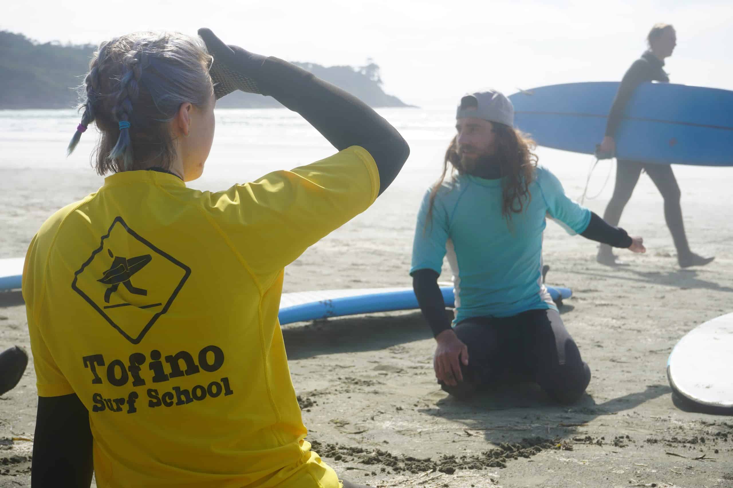 Group of surfers getting prepared to surf